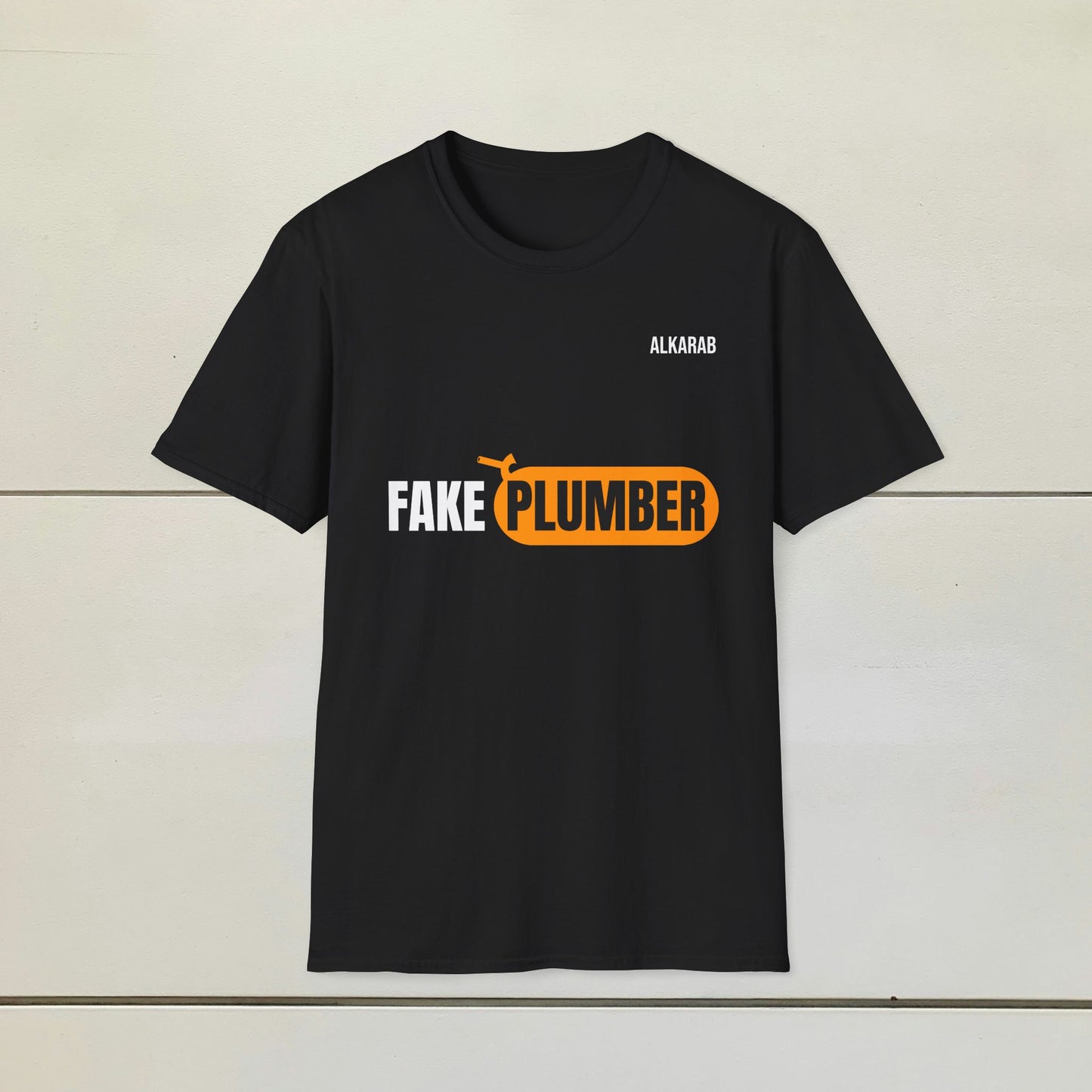 FAKE PLUMBER – Funny Unisex T-Shirt | Printed in USA